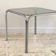1970s coffee table glass and chrome steel