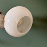 Vintage globe wall sconce in white opaline glass with floral decorations