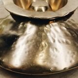 Vintage "saucer" ashtray in hammered brass