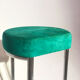 Contemporary aluminum stool and green/blue velvet