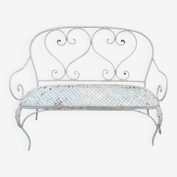 Old wrought iron garden bench