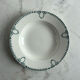 Set of 3 St Amand deep plates with green crown decoration.