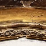 Large golden oval mirror