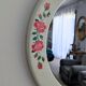 Vintage round mirror Syla model 6131 with rose decoration.