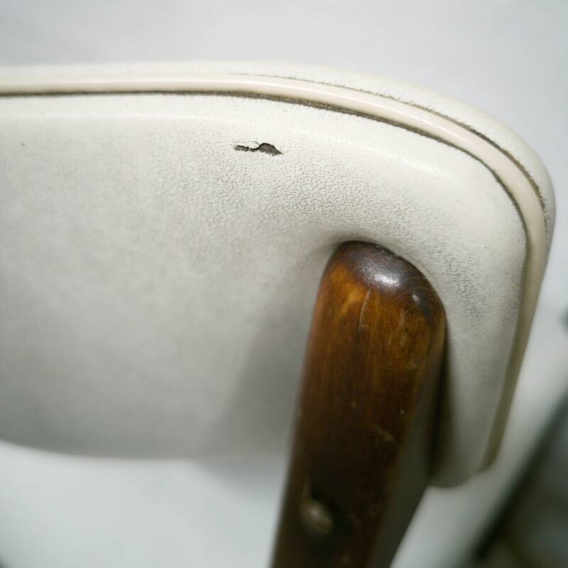 Pair of vintage teak and skai chairs