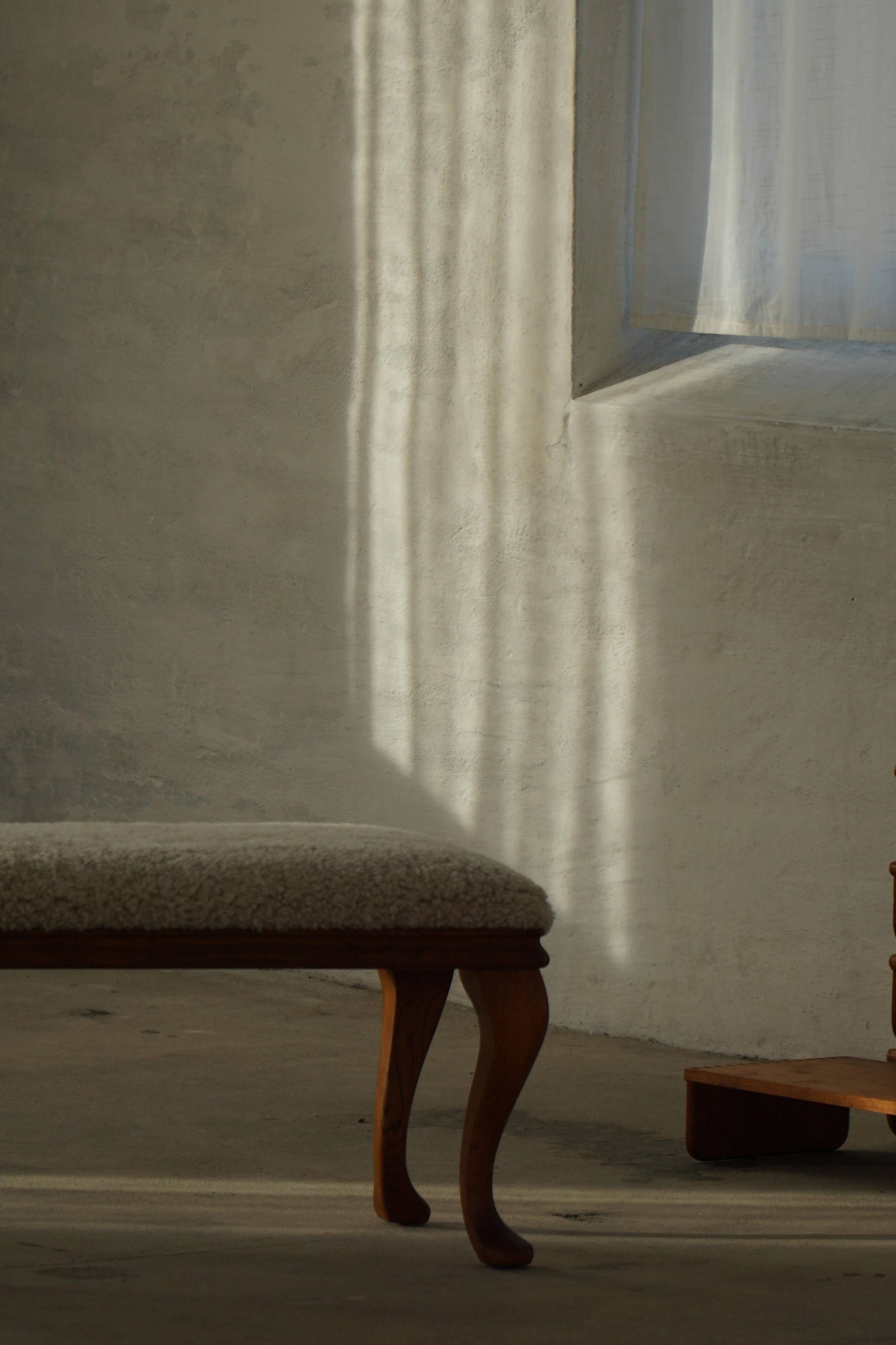 Danish rococo-style bench, cabriole legs and lambswool seat, early 20th century.