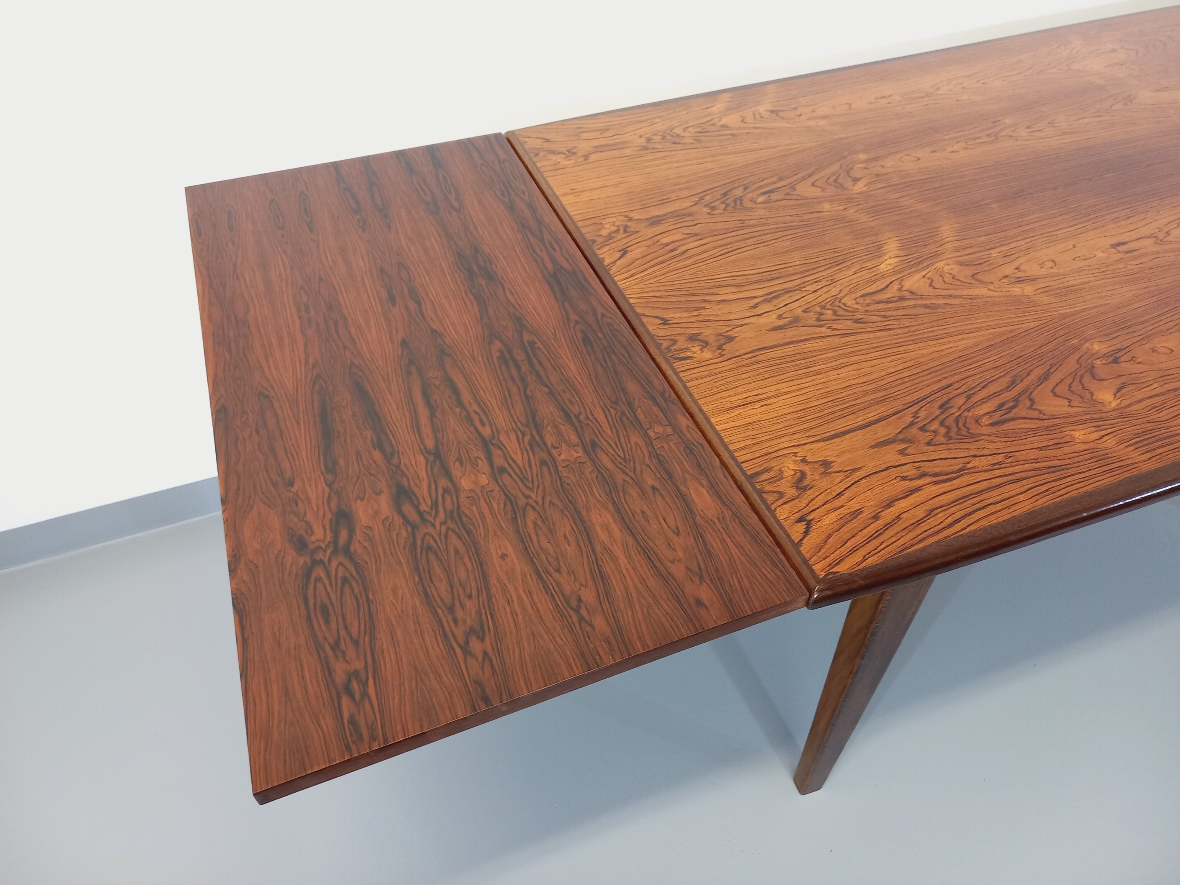 Vintage Scandinavian style dining table from the 50s 60s in rosewood with extensions