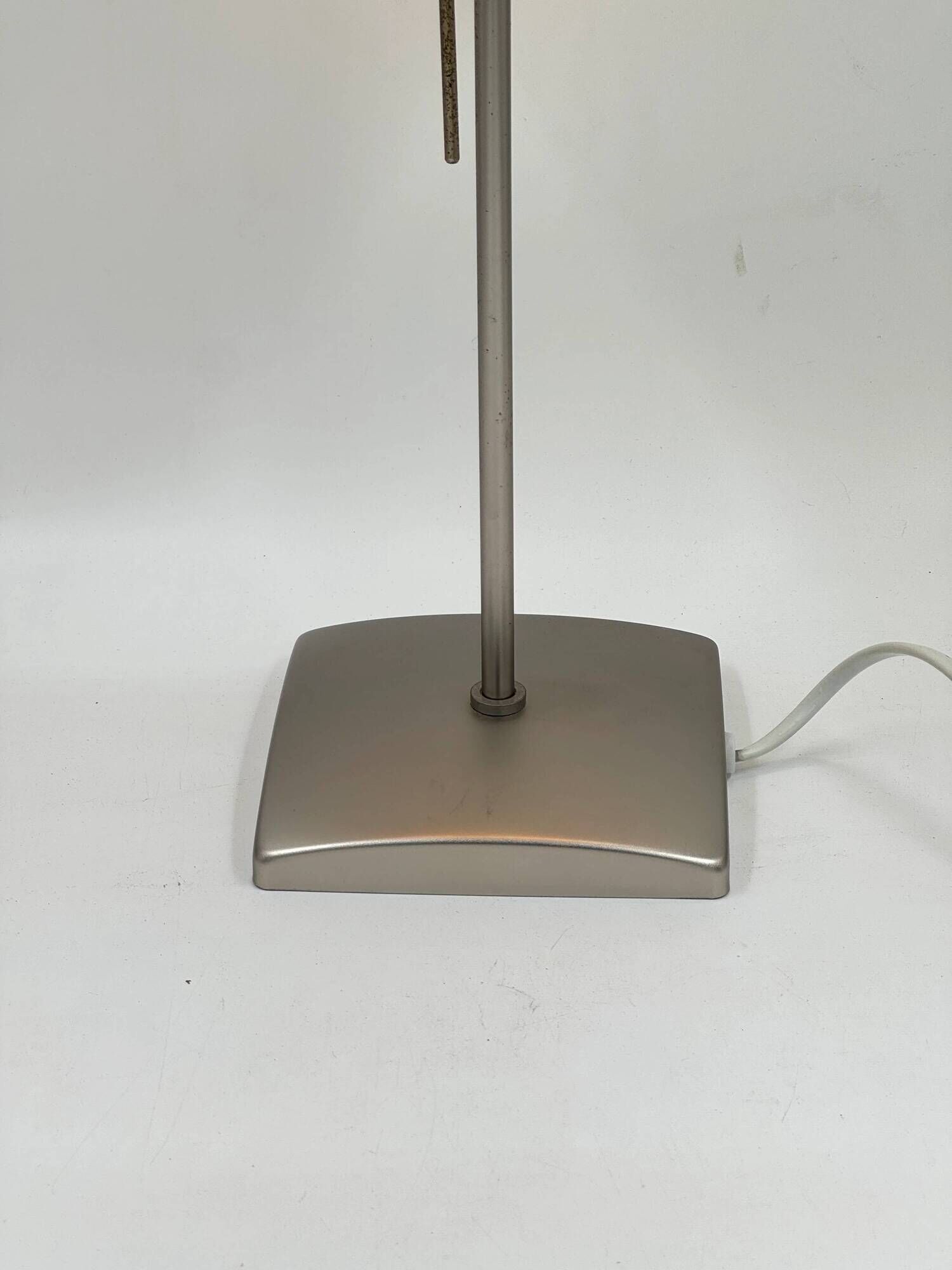 Vintage table lamp made of crumpled rice paper, with a matte metal base.