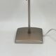 Vintage table lamp made of crumpled rice paper, with a matte metal base.