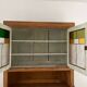 Antique dresser with glass doors and fleur-de-lys from the 50s