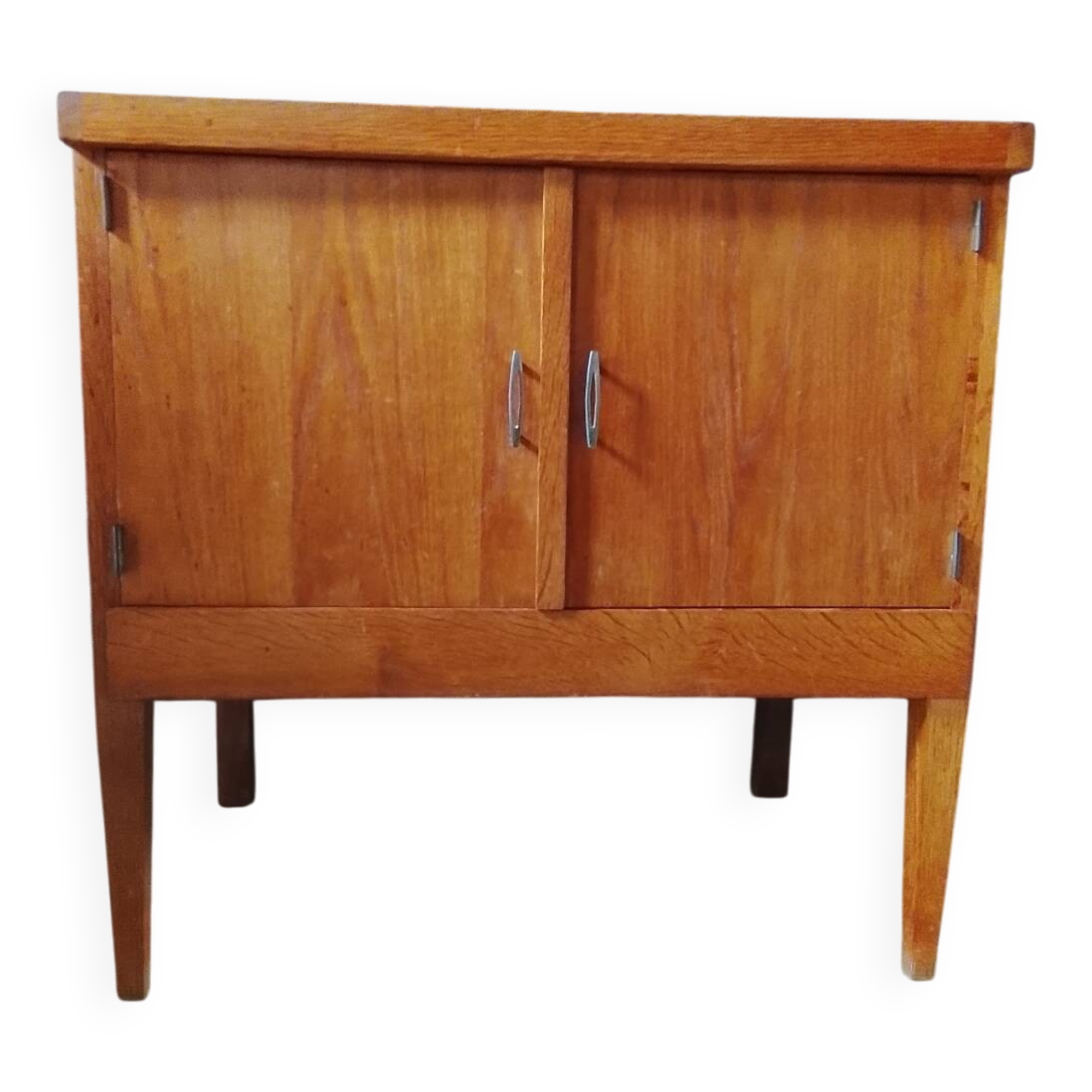 Vintage storage unit with two doors and four drawers.