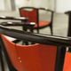 Table and 6 armchairs Baumann Diese, design Pagnon Pelhaître, Wenge color and red,