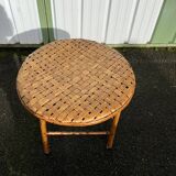 Rattan side table with round woven top