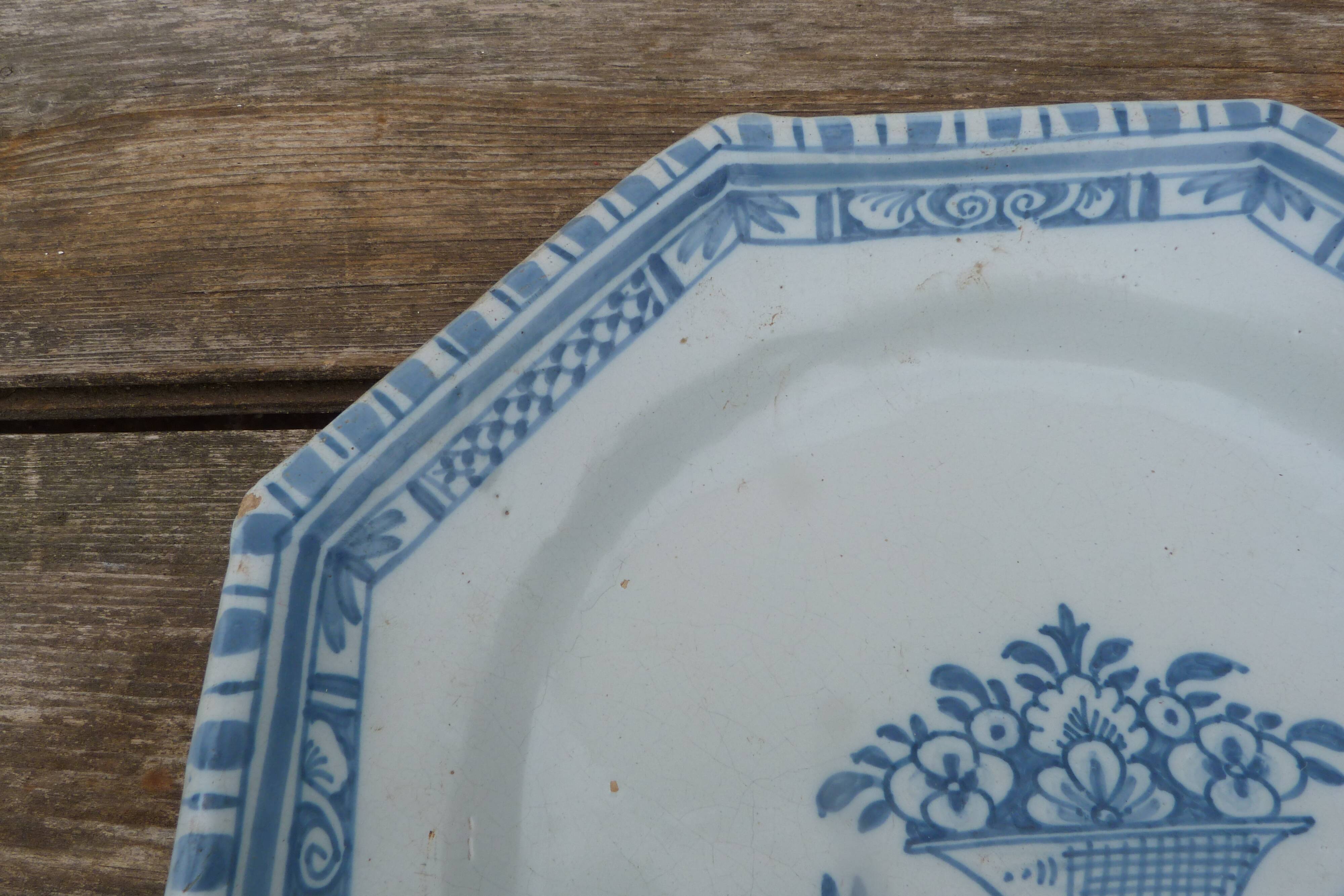 Large octagonal antique plate in Rouen faience.