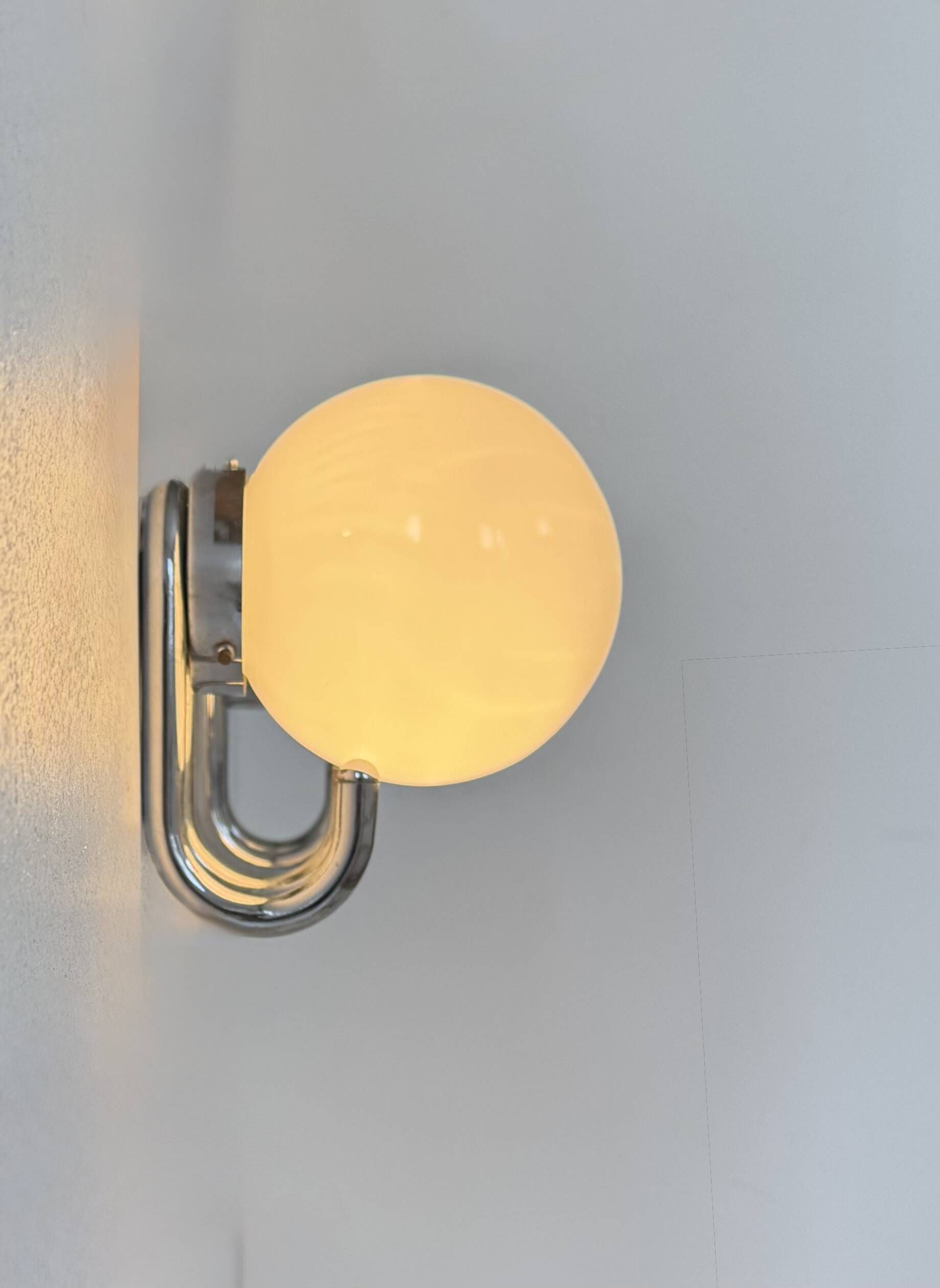 Pair of vintage wall lights, chrome metal and opaline, France, 1960.