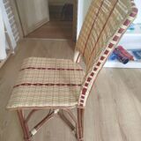 Beige and red rattan and resin chair