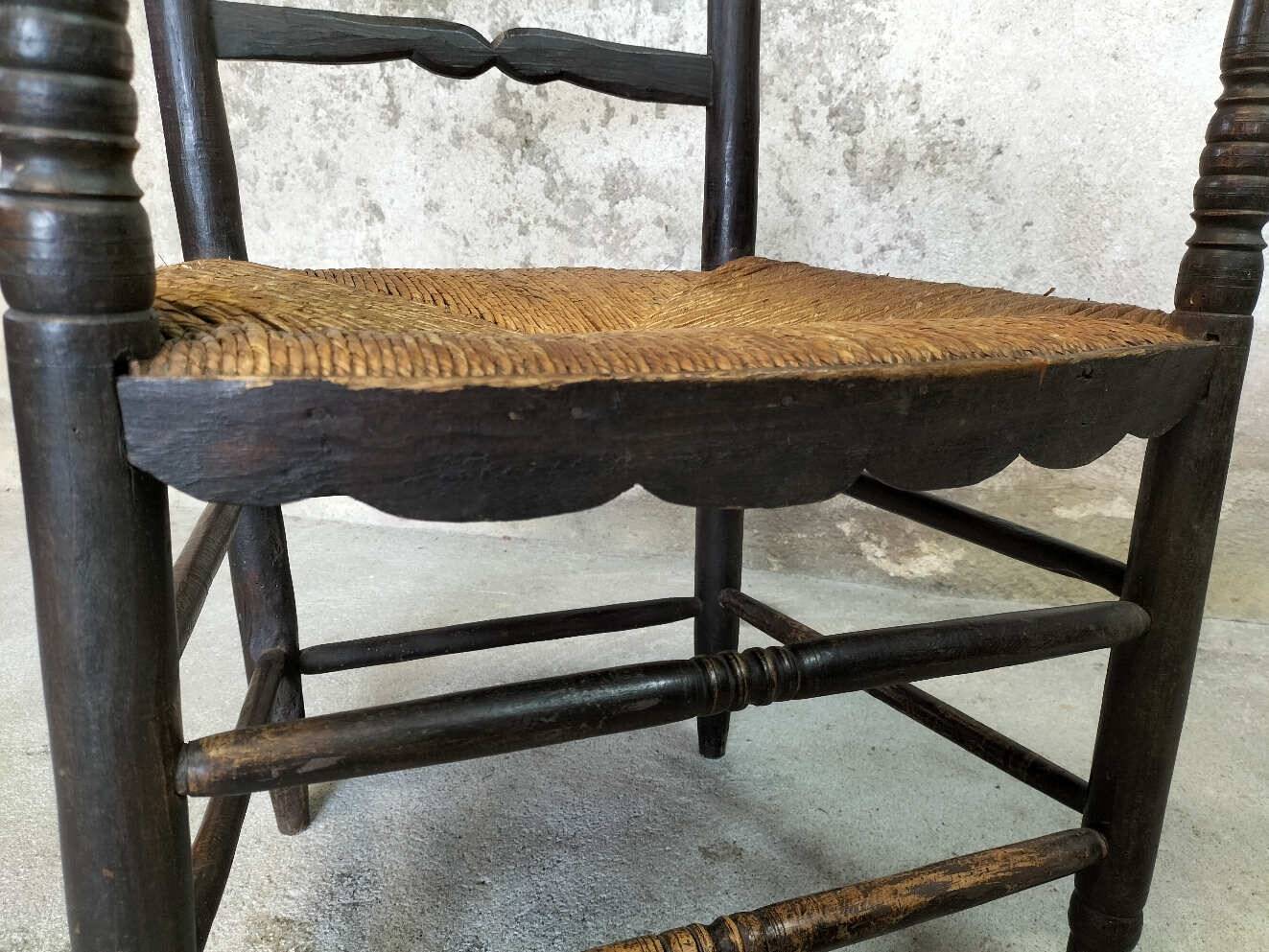 High back straw armchair