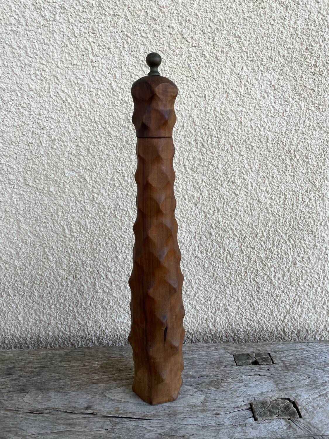 Large carved wooden pepper mill