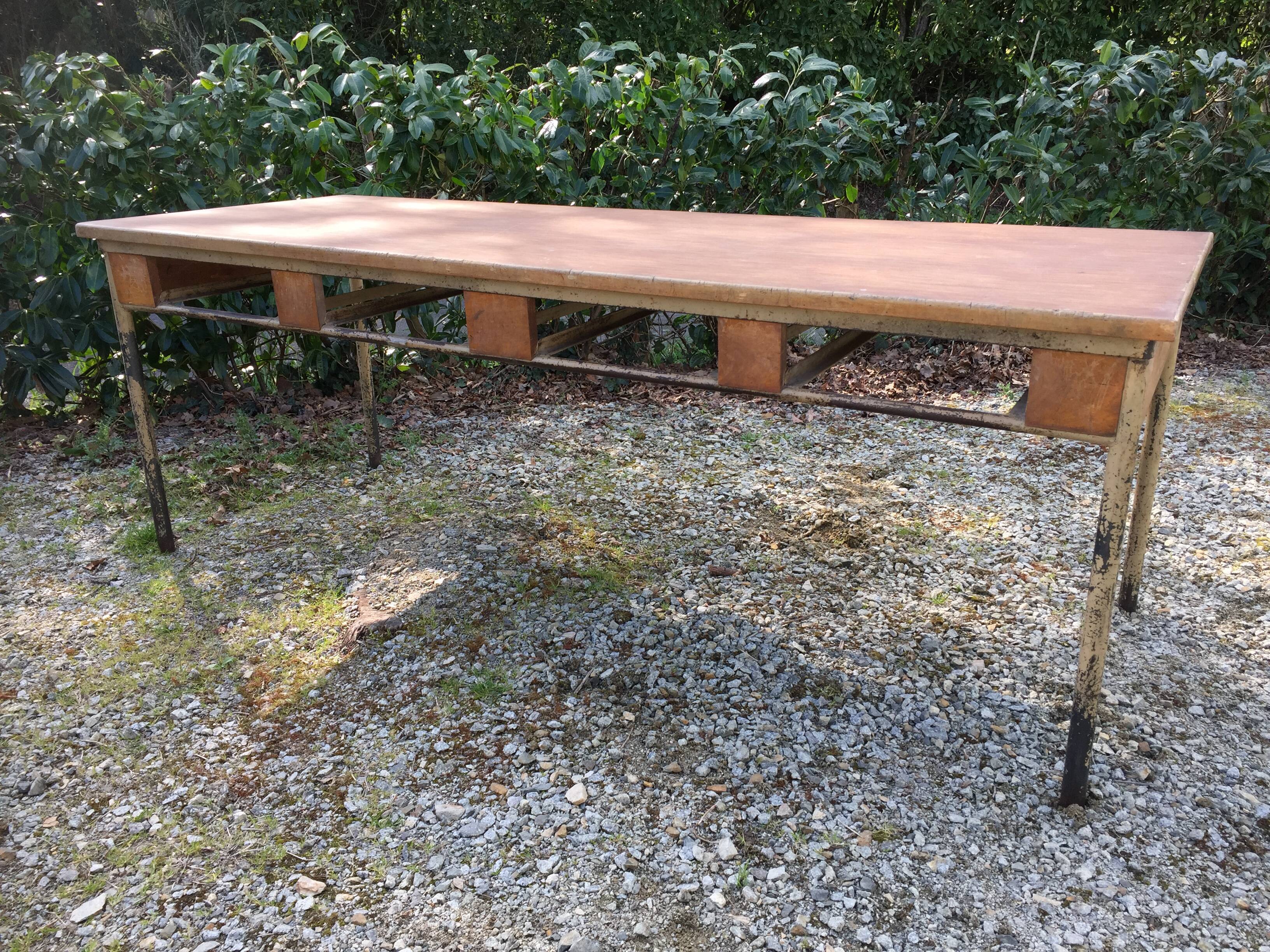 Vintage modernist table with metal tubular base