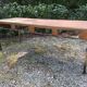 Vintage modernist table with metal tubular base