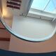 Vintage oval smoked glass mirror