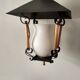 suspension lanterne noire et doré avec opaline blanche