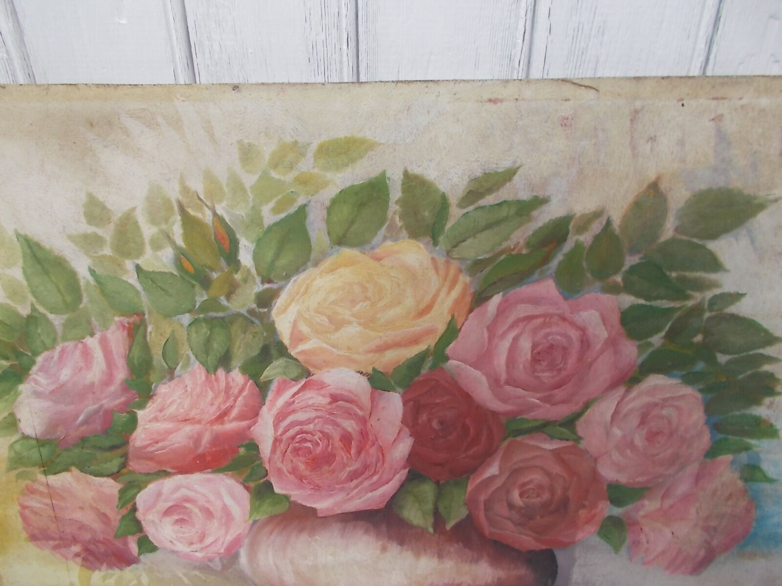Tableau of a bouquet of flowers on a double-sided wooden panel.