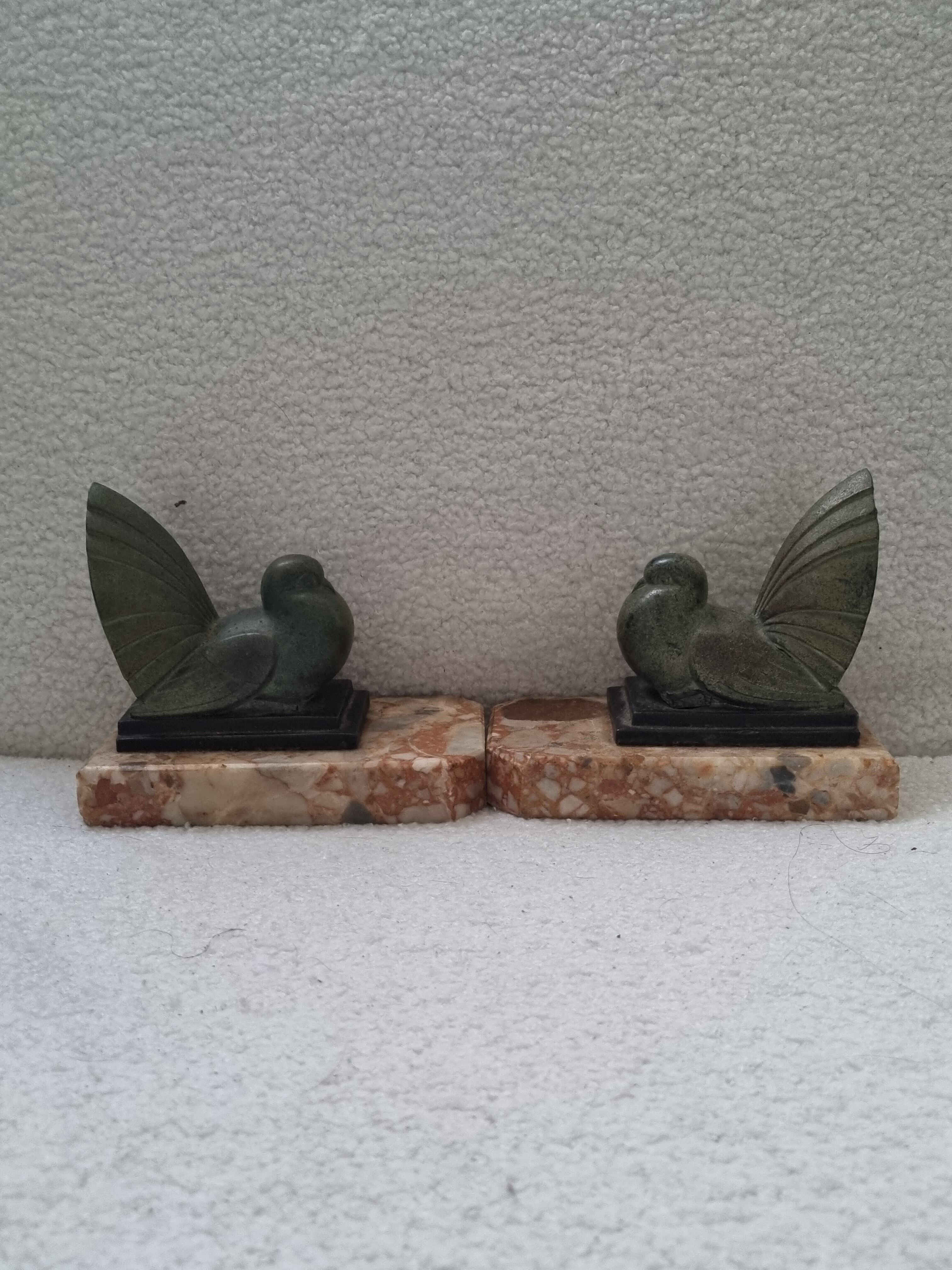 Pair of greenhouse book Art Deco animal sculpture marble base