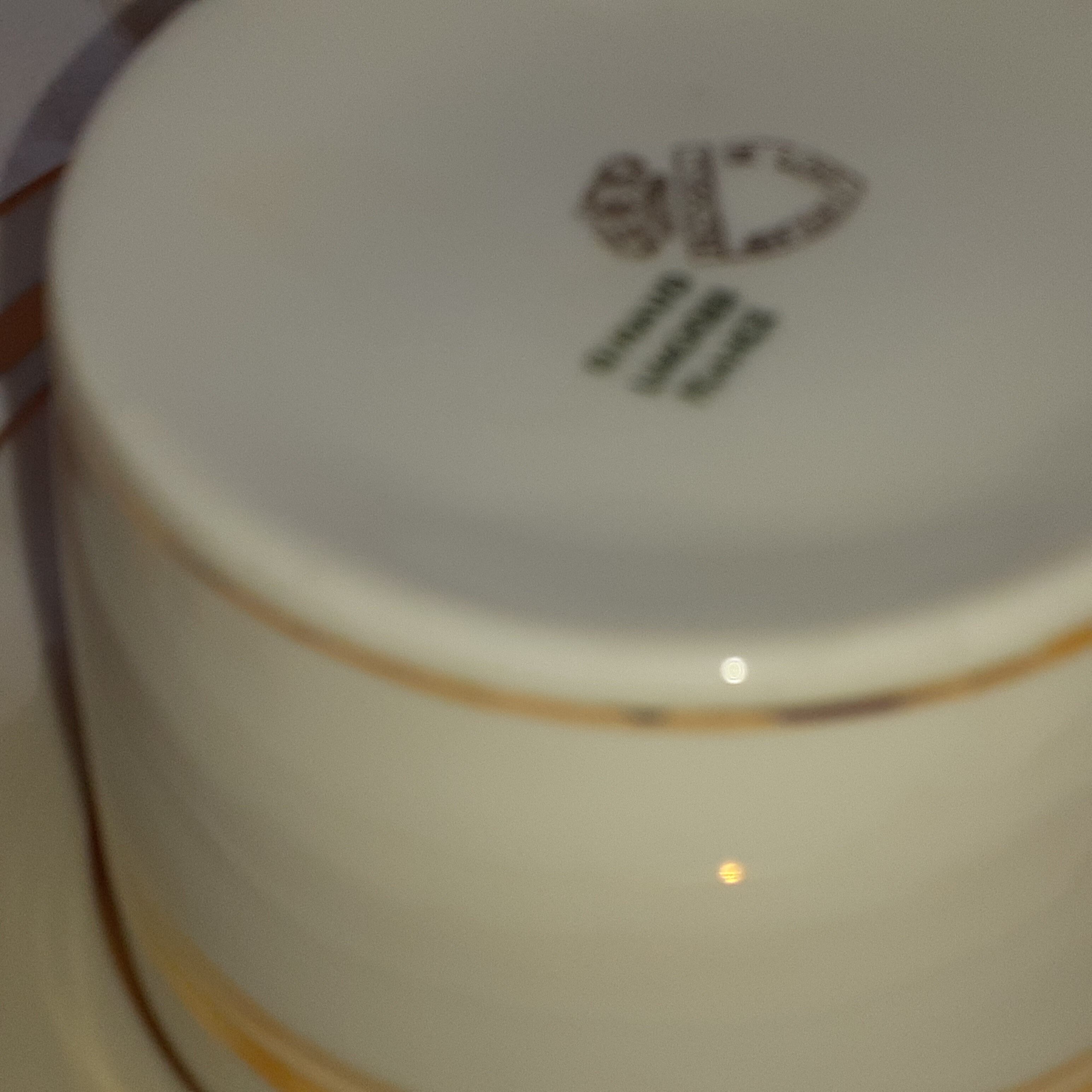 6 white cups and their limoges porcelain saucers. Signed Giroud.