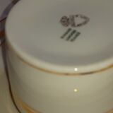 6 white cups and their limoges porcelain saucers. Signed Giroud.