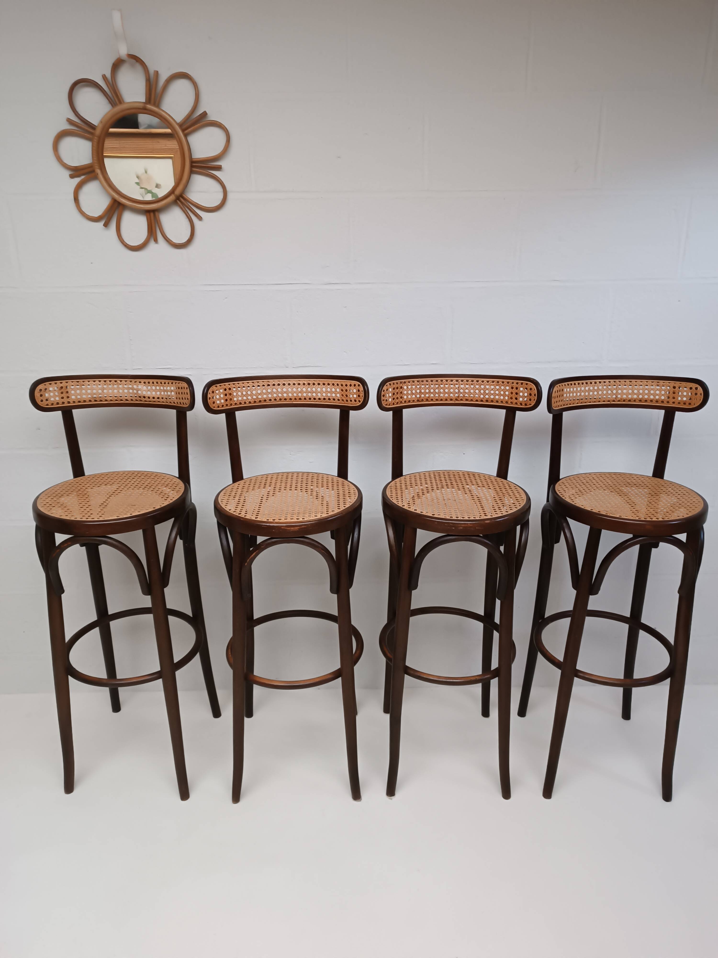 4 curved wood and cane bar stools