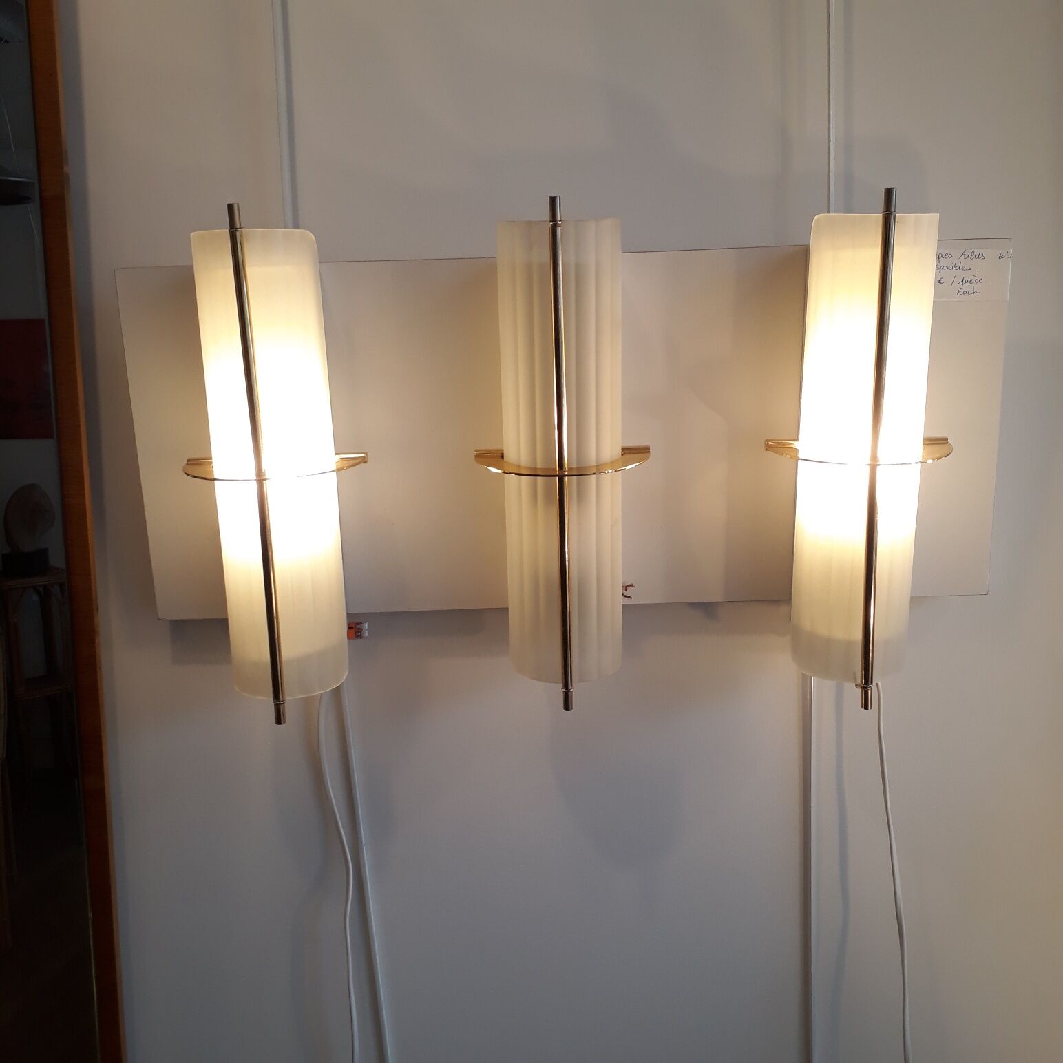 Pair of brass Arlus sconces and shortbread glass