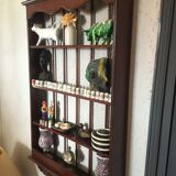 Carved wooden wall shelf for collection or other.