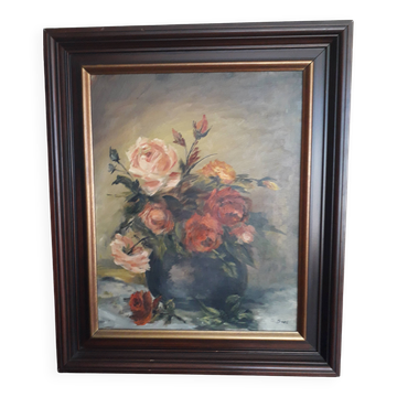 Antique oil painting depicting a bouquet of roses