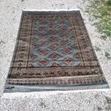 Old oriental carpet made hands. Signature. (175 x 125 )