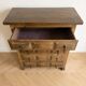 Antique solid wood chest of drawers with five drawers.