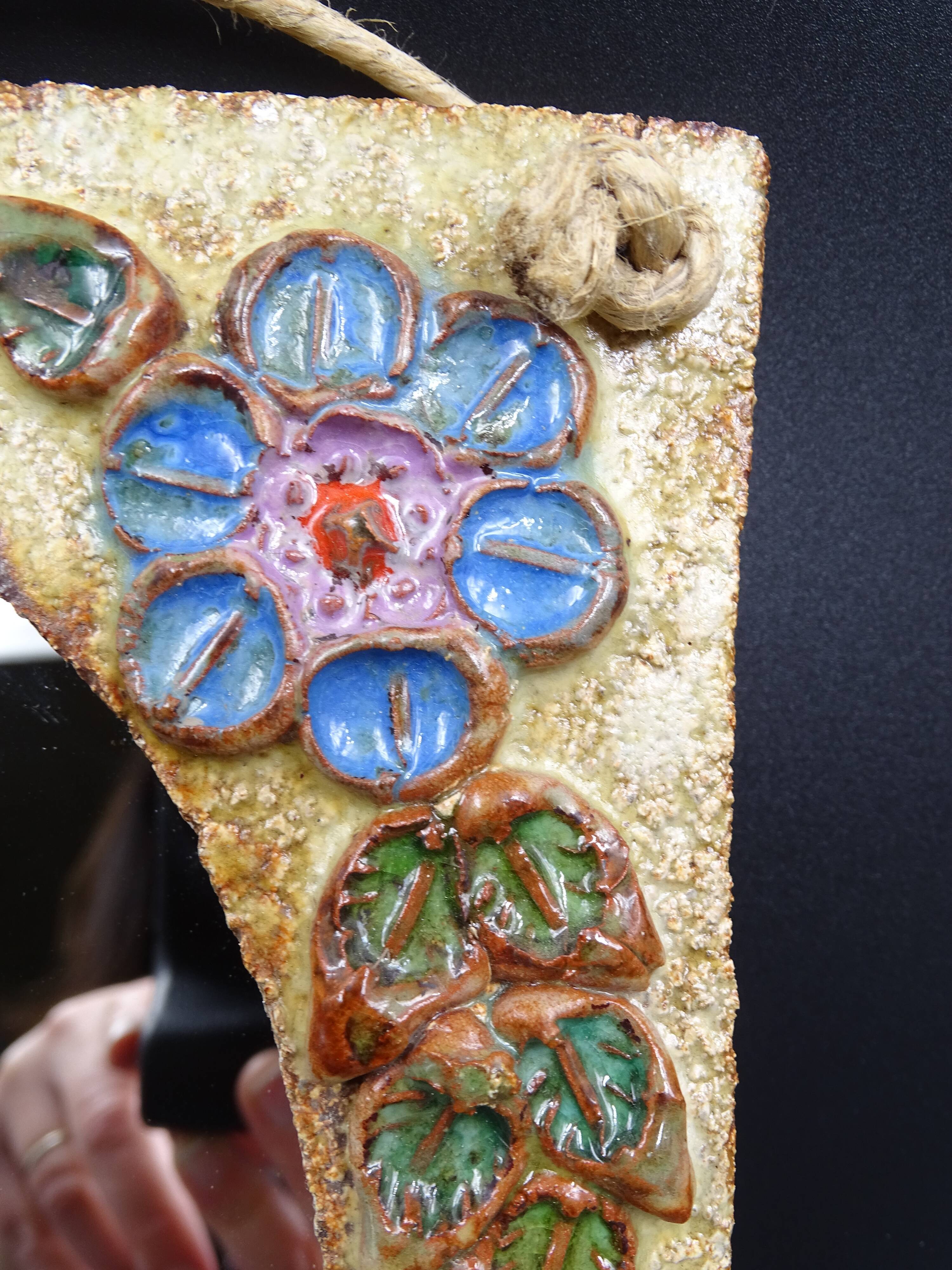 Flower-decorated sandstone mirror, circa 1970