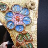 Flower-decorated sandstone mirror, circa 1970