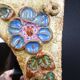 Flower-decorated sandstone mirror, circa 1970