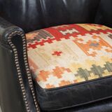 Fauteuil en cuir de vachette noir