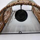 Glass and rattan sconce