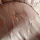 Pair of Hollywood Regency style cabriolet armchairs in satin pink, 1970s.