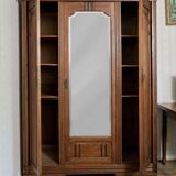 Old solid wood wardrobe with three vintage mirror doors