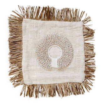 Perla cushion cover with raffia fringes and shell circle
