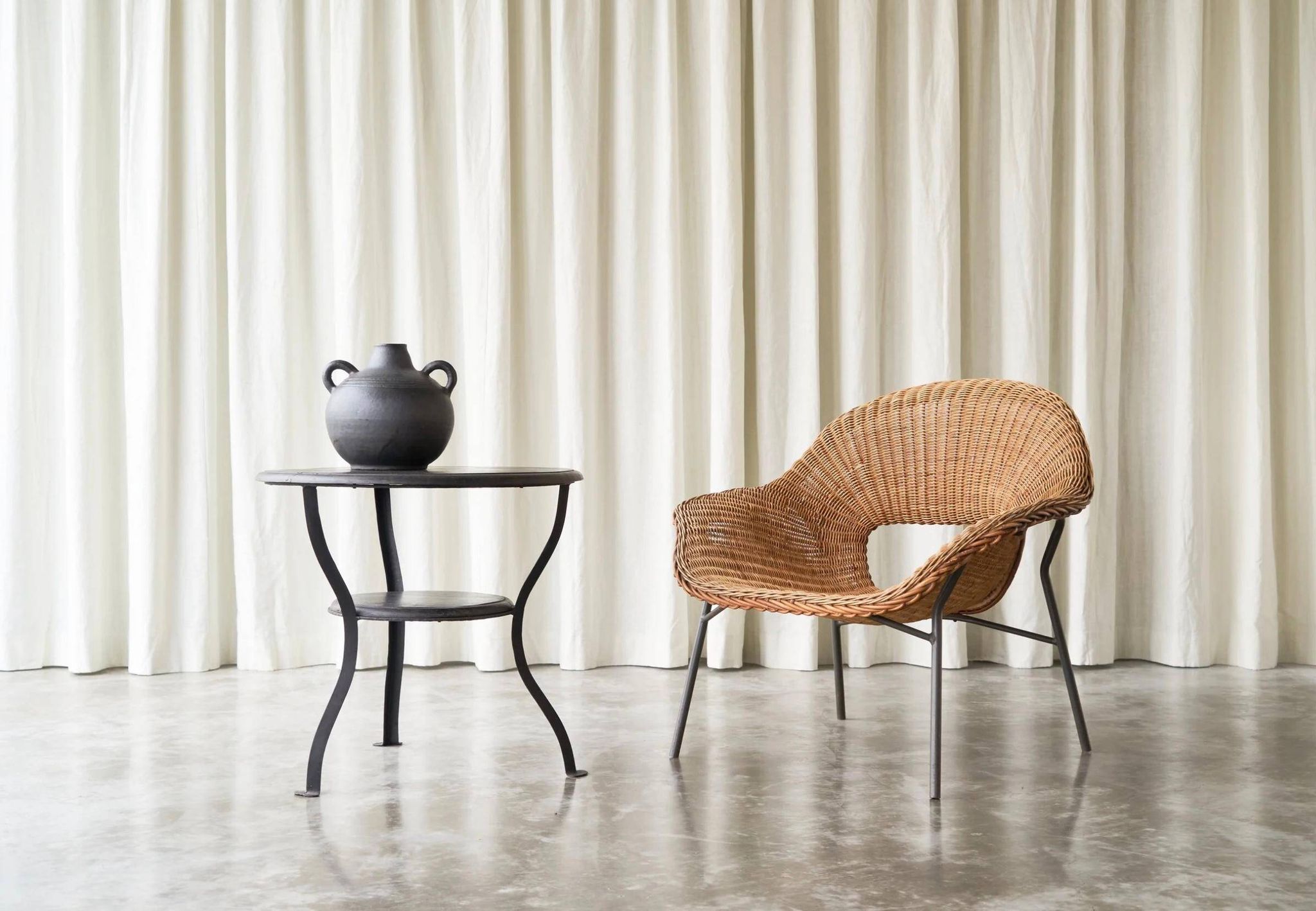 Sculptural lounge chair in rattan and metal, 1960s