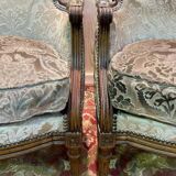 Paire de fauteuils bergères de style Louis XVI