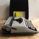 Old writing machine polyjo super 75 bakelite grey + vintage black trunk