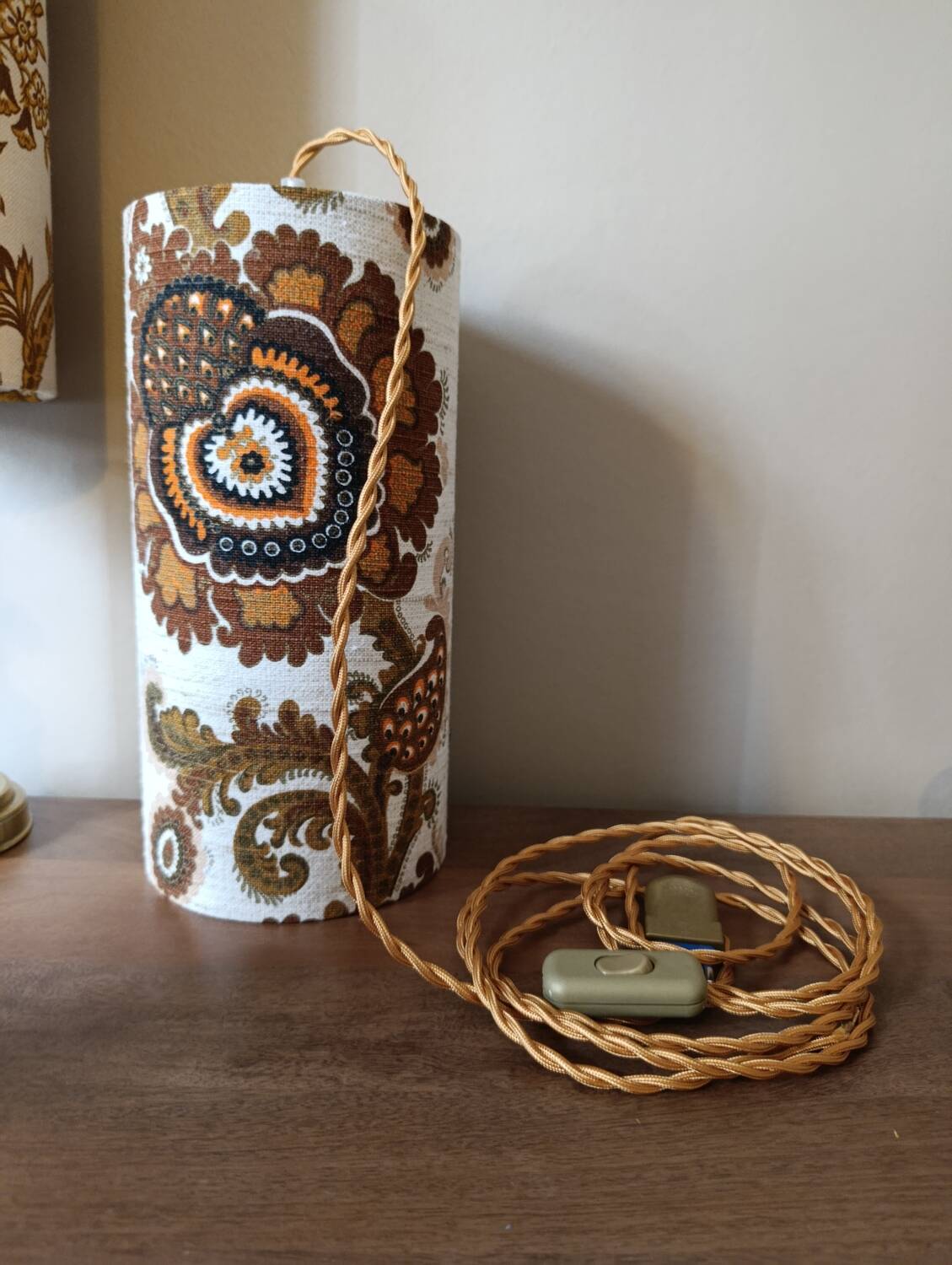 Vintage portable lamp with authentic seventies floral linen fabric.