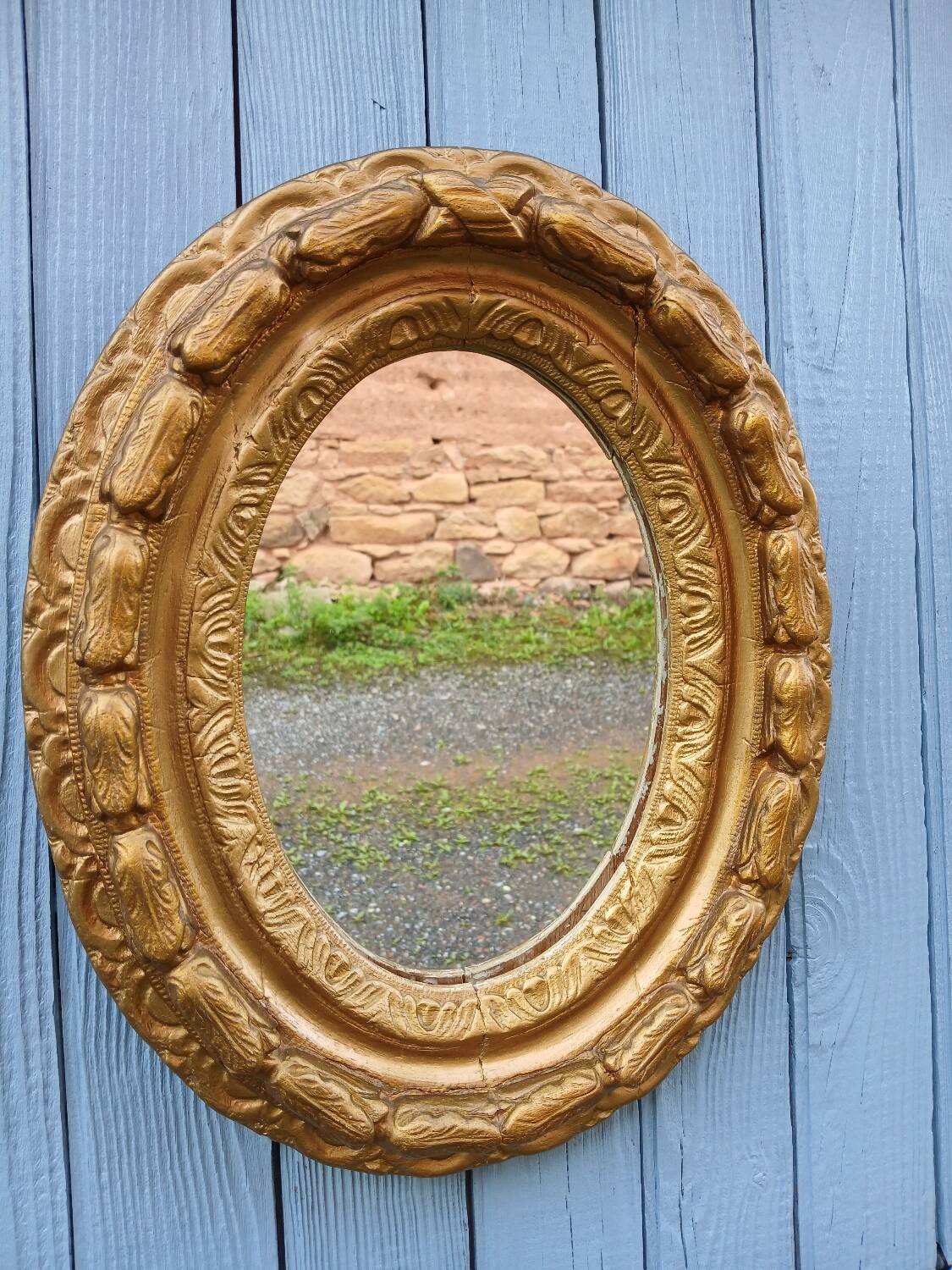 Miroir ancien en bois doré