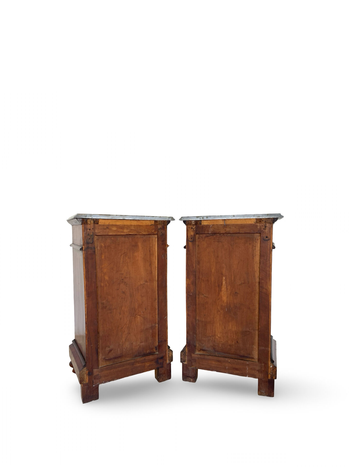 A pair of antique walnut bedside tables from the 1890s.